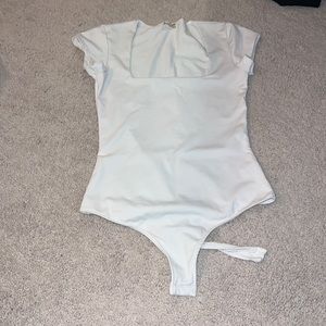 white bodysuit